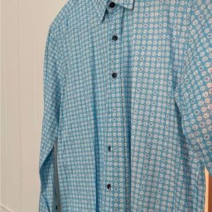 Robert Herjavec collection, freshly pressed and clean.